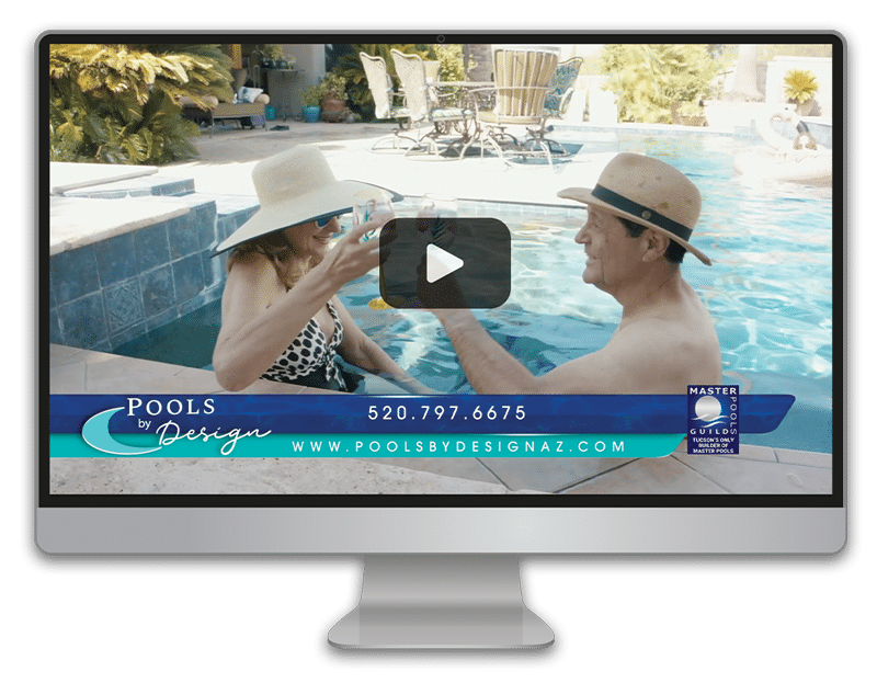 A mac screen showing a video paused on screen with the still shot of a couple in their pool enjoying a drink together