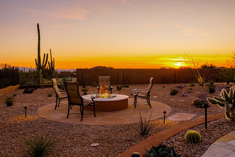 A luxury outdoor living area with a fire pit in Tucson, AZ