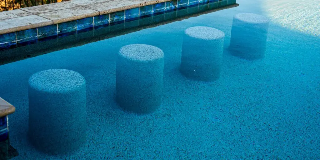4 swim up bar seats designed by pools by design