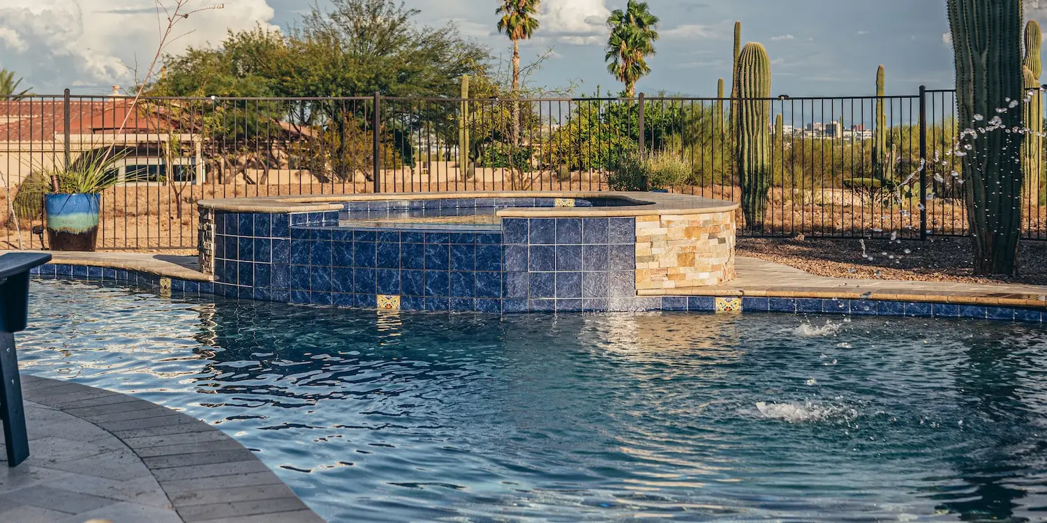 pool with hot tub designed by pools by design