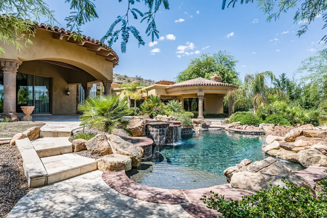 home with gorgeous natural pool near hillside